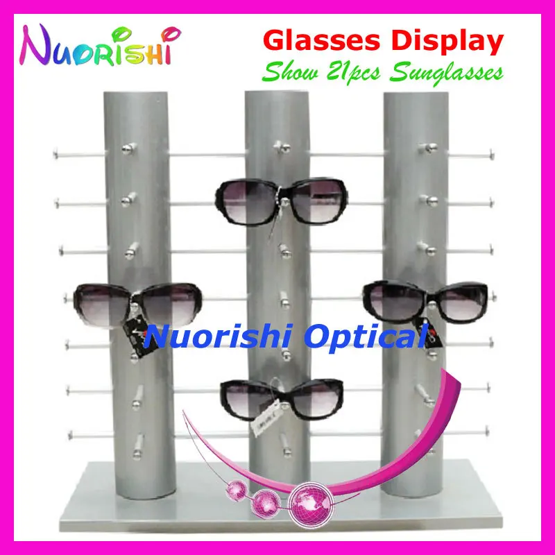 Серебряные очки солнцезащитные магазин очков выставочные стенды реквизит полка