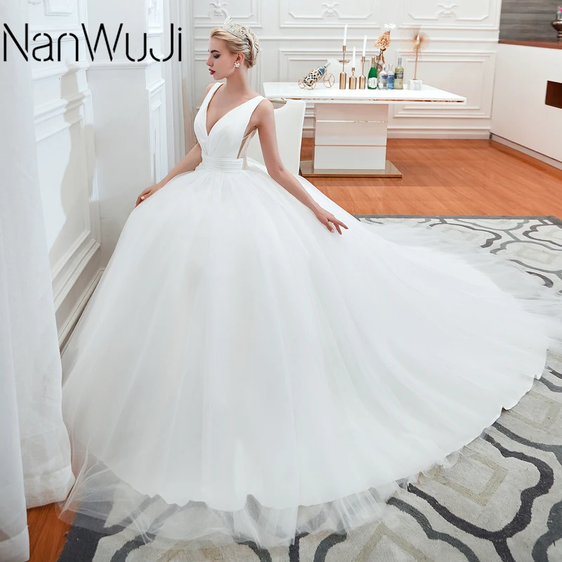 

V Neck Wedding Dresses Light Ivory Floor Length Applique Open Back Sleeveless A Line Backless Bridal Dress Vestido De Noiva