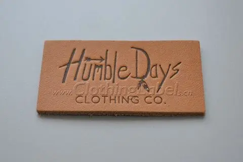 Пользовательская кожаная этикетка для джинсовой ткани тисненый логотип высечка