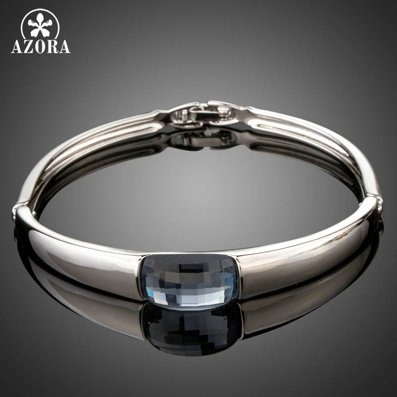 Женский браслет с кристаллами AZORA белый и золотой на застежке выполненный из