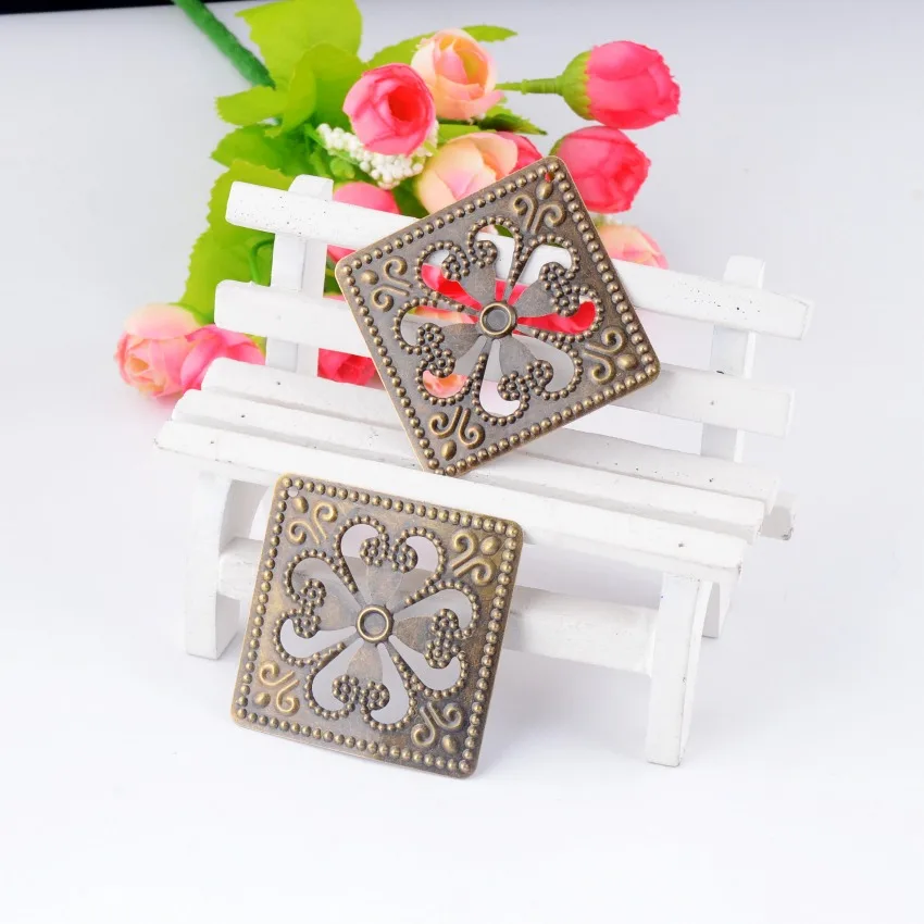 Свободные квадратные филигранные розетки в бронзовом цвете фоторозетки