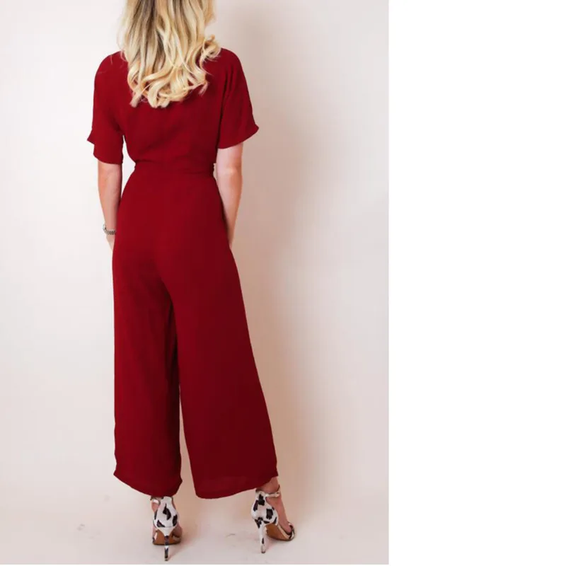 Женский комбинезон с короткими рукавами и глубоким v образным вырезом Облегающий