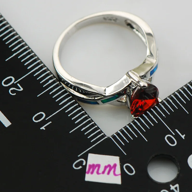 Женское кольцо из серебра 925 пробы с гранатом и голубым огненным опалом размеры 6 7