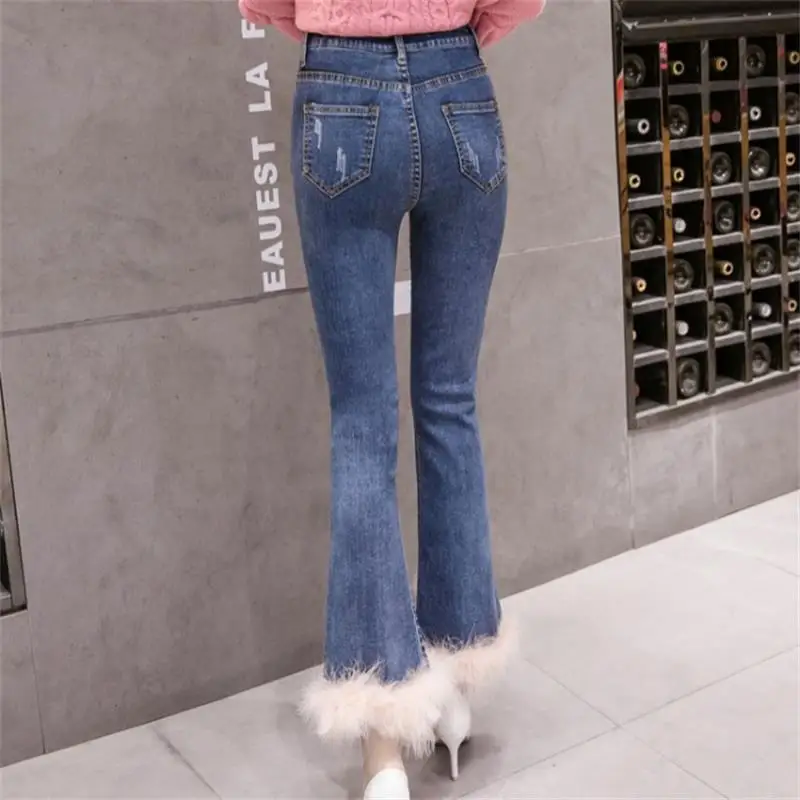 Новинка джинсы с высокой талией расклешенные лоскутные меховые штаны