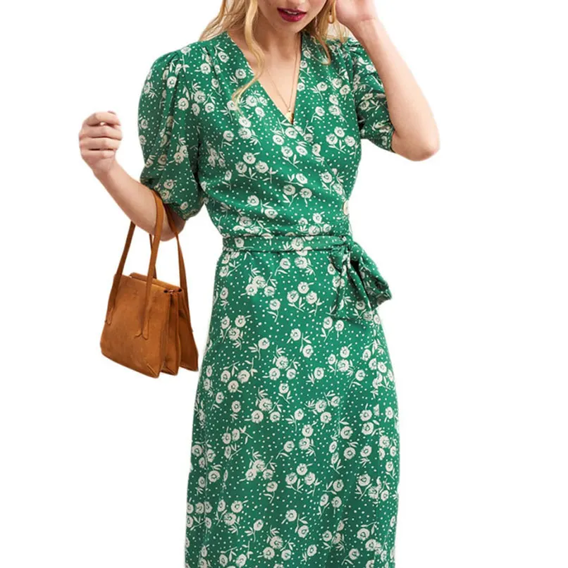 Женское платье средней длины с v образным вырезом и пышными рукавами