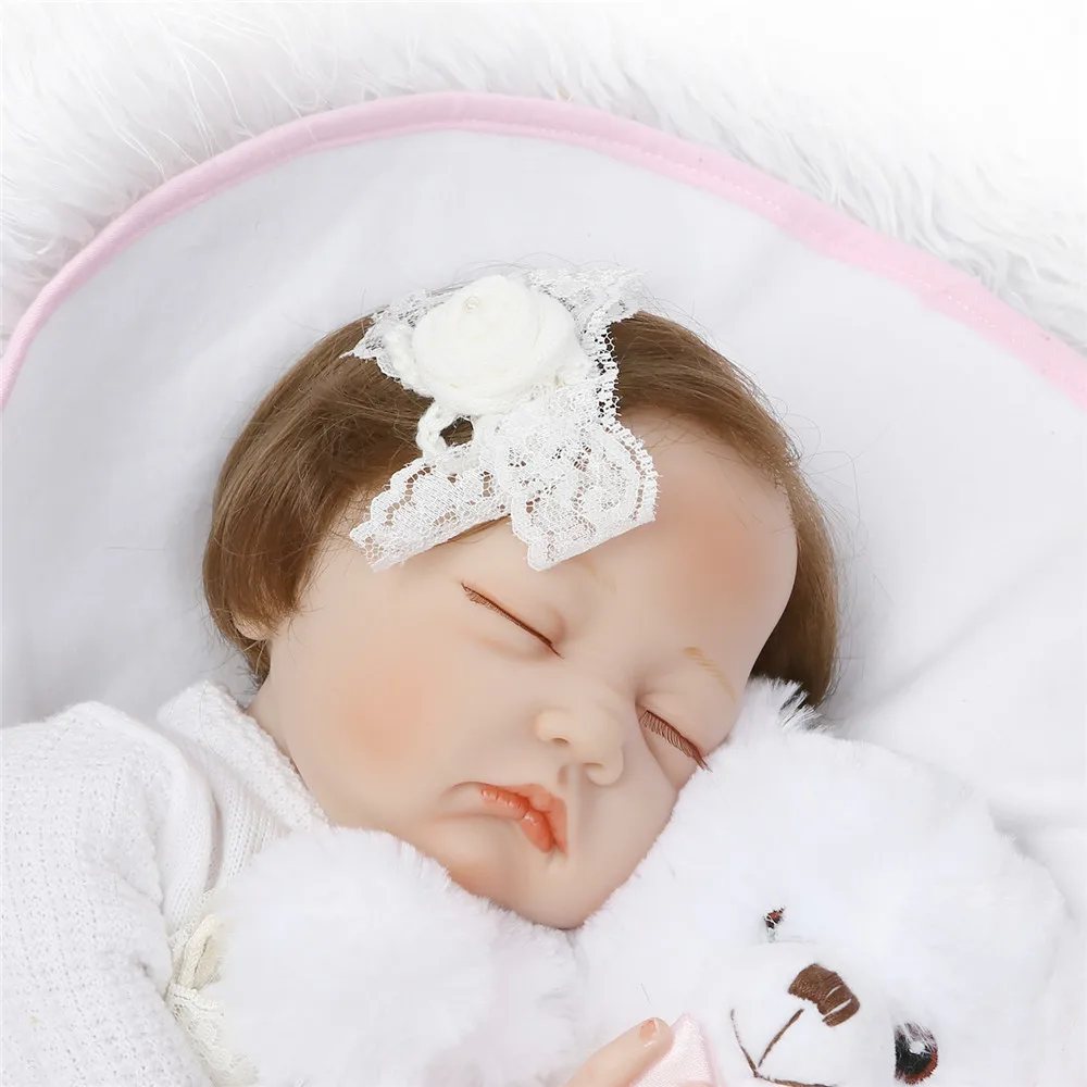 

2018 bebe NPK dolls reborn for sale 22"soft silicone reborn baby girl dolls children gift white bear pacifier bottle bonecas