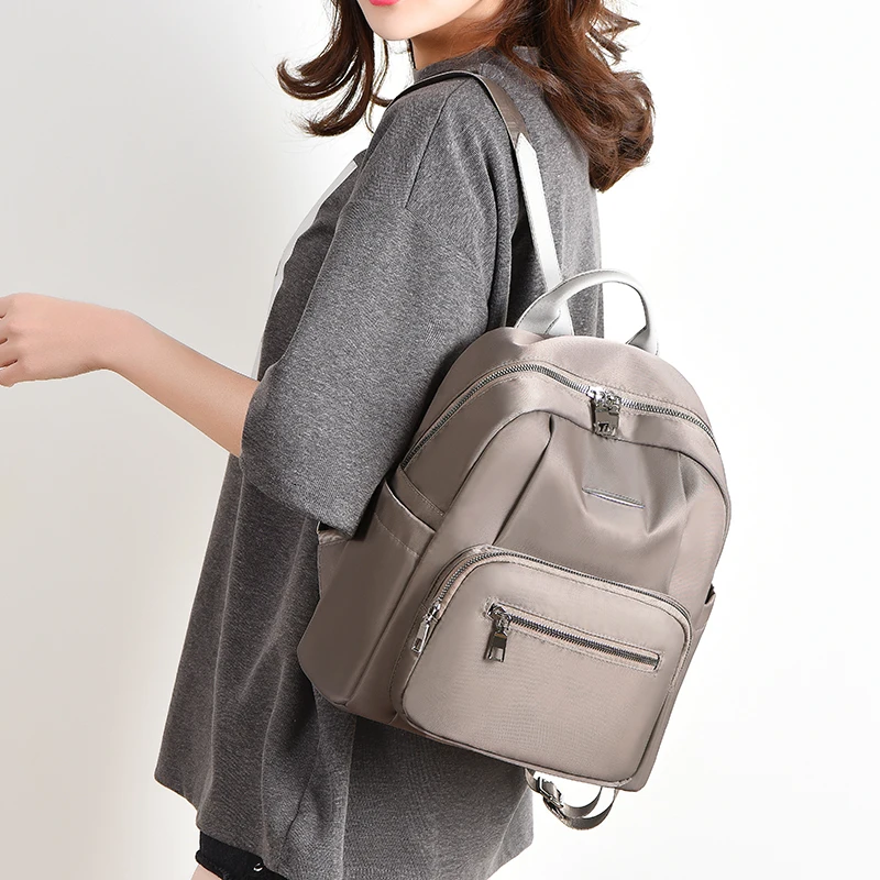 Новинка 2019 женский водонепроницаемый рюкзак ткань Оксфорд школьные сумки