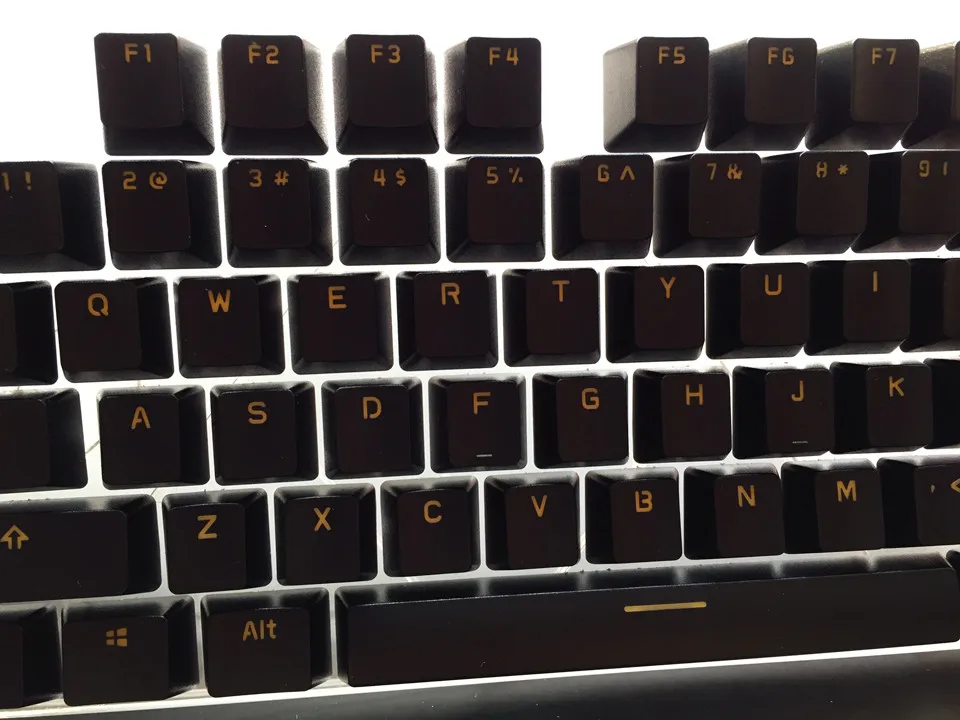 Двусторонний оранжевый ключ с подсветкой 104 ключа в комплекте черный АБС пластик