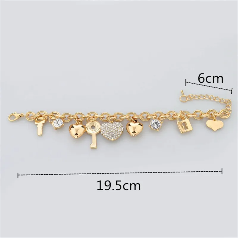 Женский браслет attrattto LOVE золотого цвета с сердечком и шармами SBR140221|bracelets for|heart charm