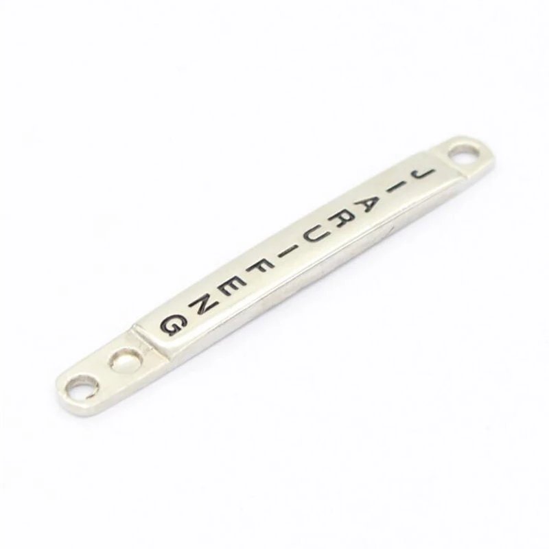 

rectangle 0.7*6.2cm silver zinc alloy garment labels custom sewing on luggage and bags Laser engraving metal labels for clothing