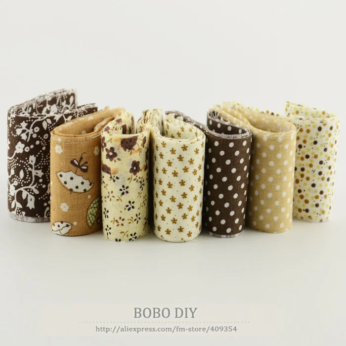 Dropship new arrivals 7pcs/ lot 100%cotton jelly roll coffee sets quilting fabric trips handmade patchwork sewing 5cmx100cm|fabric serge|toy story