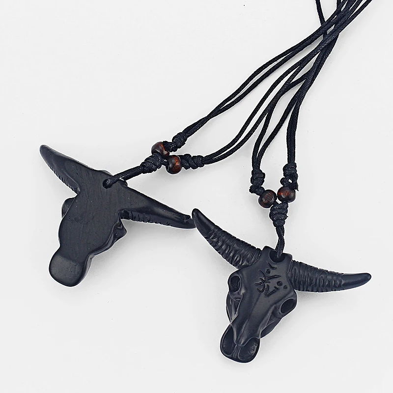 12 шт оптом черный резной Ом бык голова черепа Нгау Тау кулон имитация кости яка