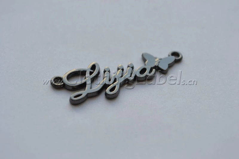 

custom metal labels for clothing, name brand label for casual dress, bags, jeans etc. gun-metal color clothing labels
