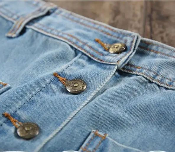 Новое поступление летние джинсовые юбки с одной пуговицей и карманами белые