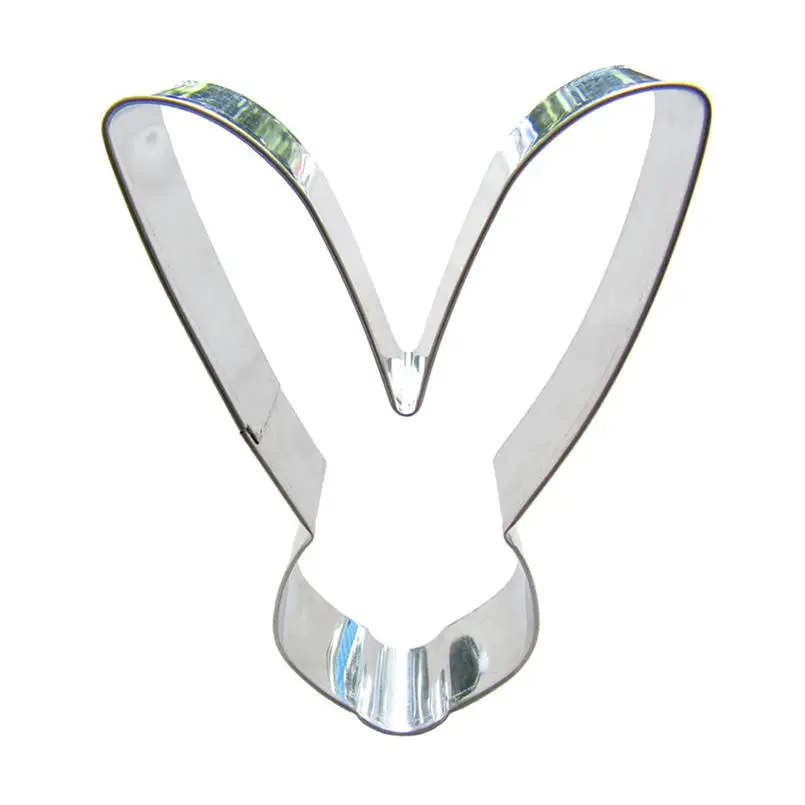 Маленькие металлические инструменты в форме белого кролика для изготовления