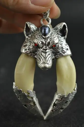 

Details about China Decorated Miao Silver Carving Lifelike Fierce Wolf Head Exorcise Pendant