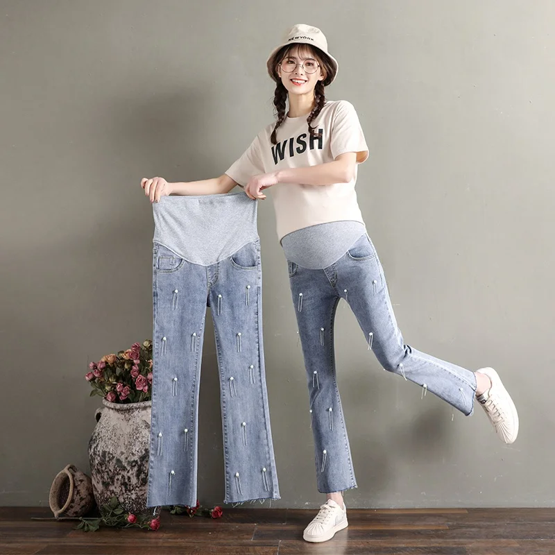 

2019 spring and summer pregnant women jeans retro beaded stomach lift jeans nine points bell pants pregnancy library