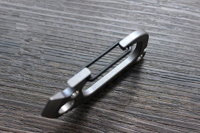 

Titanium Alloy EDC Defense Keychain Fast Buckle Crowbar Opener Tool Carabiners Buckles
