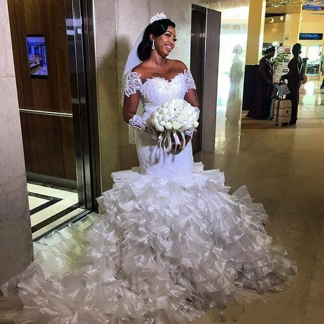 

African Mermaid Wedding Dresses Sheer Jewel Neck Tiered Skirts Plus Size Lace Appliques Long Sleeve Bridal Gown wedding gown