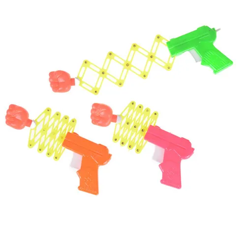 

1PCS Practical Jokes magic elastic telescopic fist gun magic tricks toys for children DIY manual toy kids toys Random Color