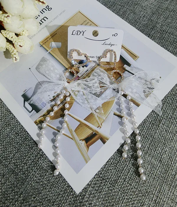 Женские серьги-подвески с большим кружевным бантом жемчугом и стразами модные