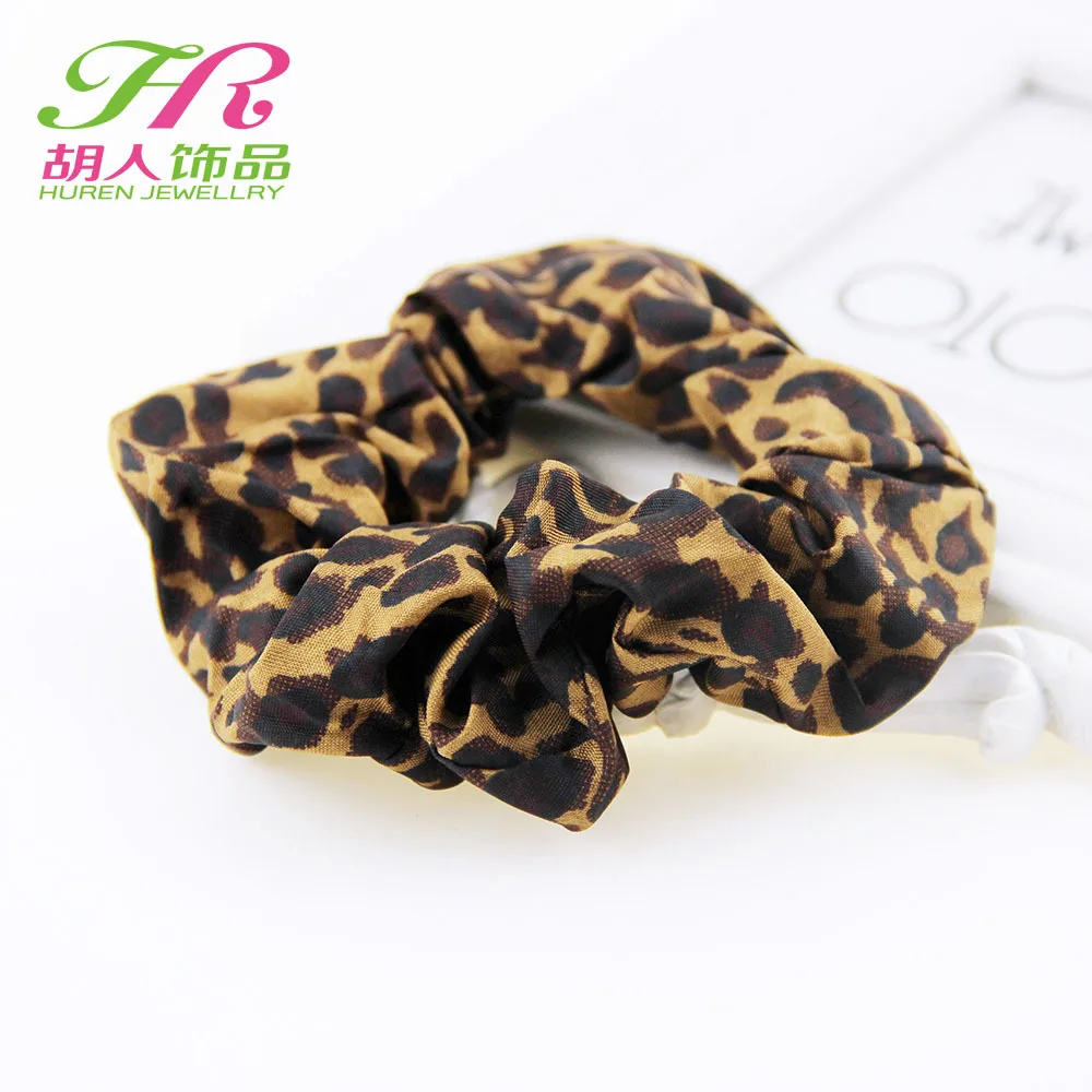 Женские аксессуары для волос в стиле леопардового принта и полоски на резинке для хвоста или косы.