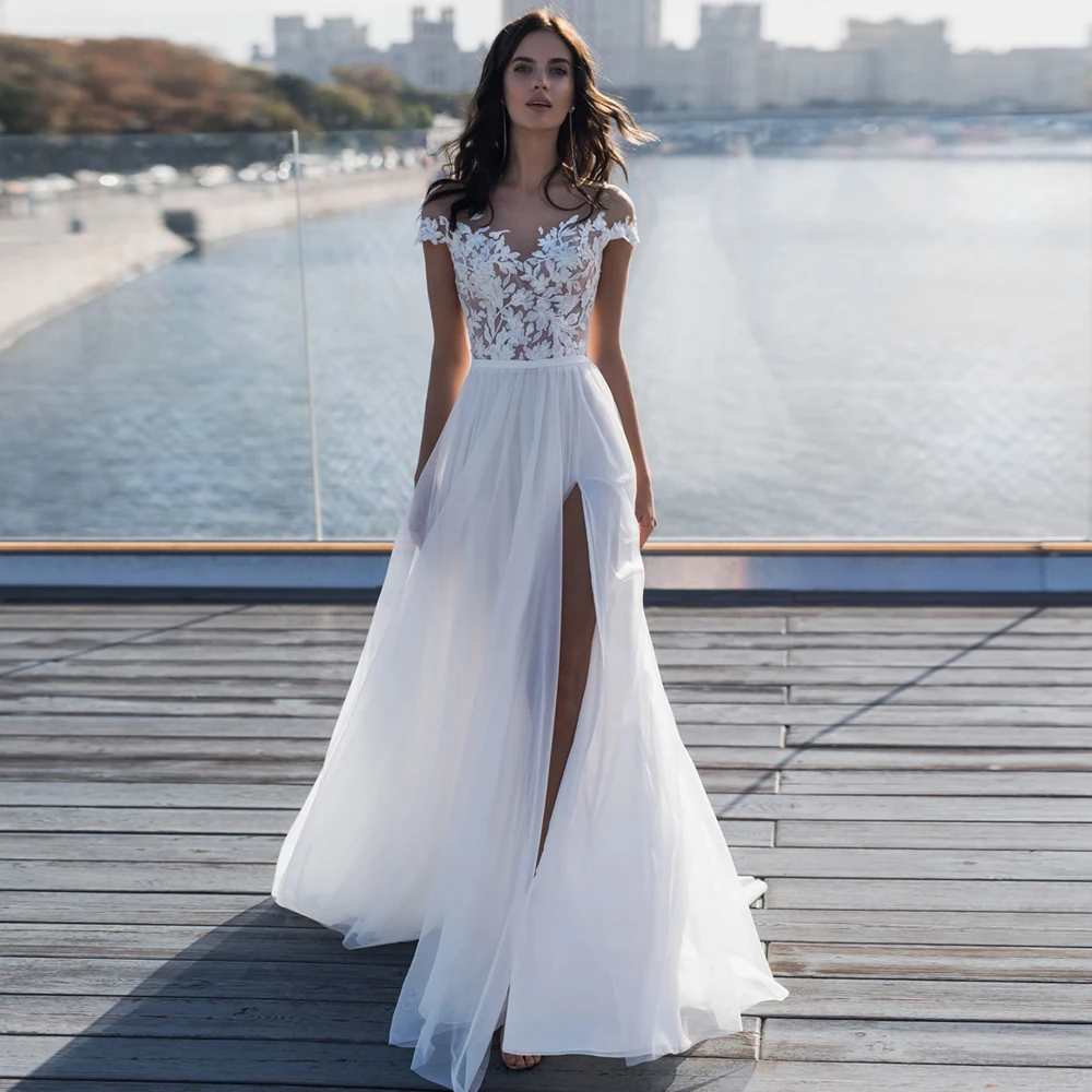 Модное богемное свадебное платье с глубоким вырезом и рукавами крылышками