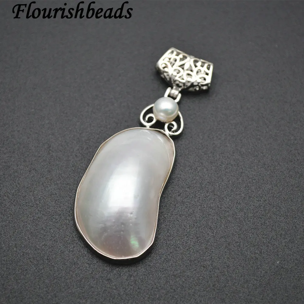 

Natural White Cambered Shell Cabochon Pendants