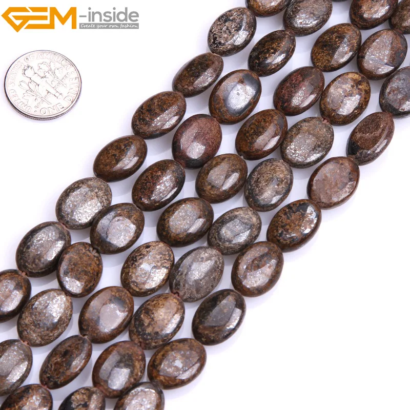 Драгоценный камень внутри натуральный плоский овальный коричневый бронзовый