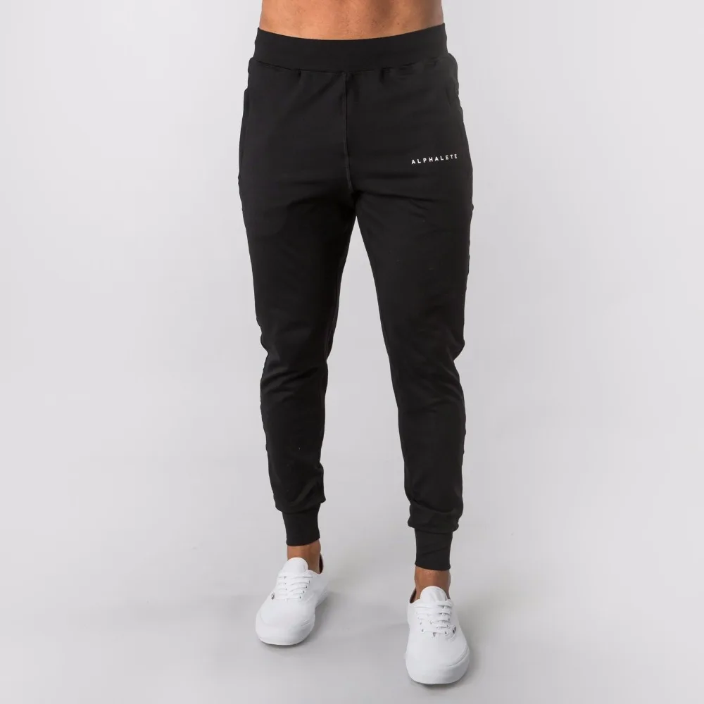 Новинка, стильные мужские спортивные штаны ALPHALETE Jogger, мужские спортивные штаны для тренировок, фитнеса, хлопковые брюки, мужские повседневные Модные обтягивающие спортивные штаны