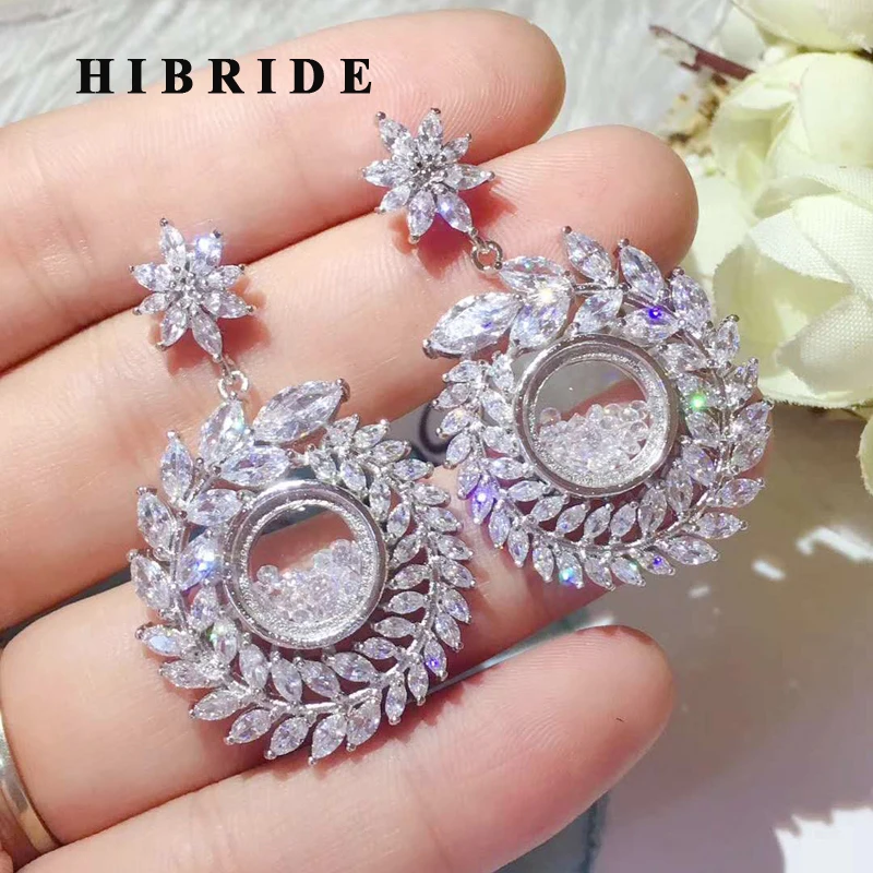 Модные модные серьги HIBRIDE в виде листьев из белого золота с фианитами для женщин