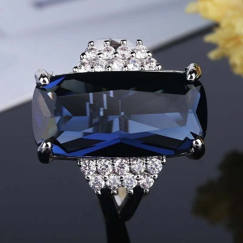 

Female Blue Austrian Crystal Princess Cut Stone Wedding Rings For Women Silver Color Filled Big White Zircon Engagement Jewelry