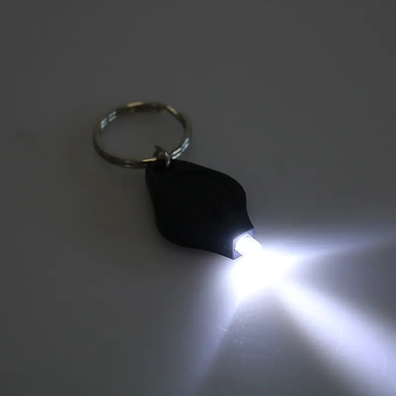 

1pcs Mini Keychain Squeeze Light Micro LED Flashlight Torch Outdoor Camping Emergency Key Ring Light plastic ABS