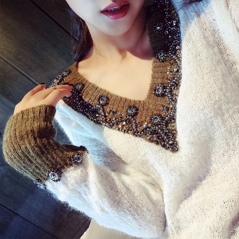 

Europe and the United States 2021 new autumn fashion female loose wool turtleneck sweater collar V openwork Beaded sweater