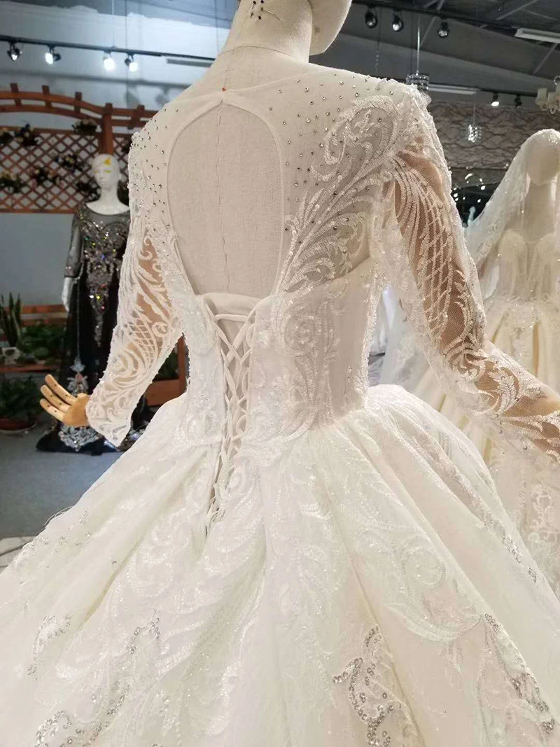 

LSS108 free shipping wedding dresses o-neck long sleeves ball gown shiny lace applique gown elegant with long train