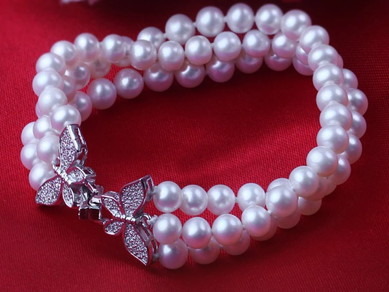 Женский подарок браслет из натурального пресноводного жемчуга 925 пробы почти