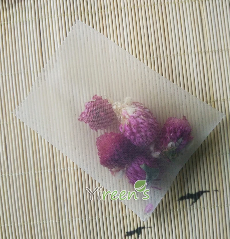 

Free shipping! 1000pcs / lot 65 X 80mm Nylon Tea Bag, Heat Sealable Pyramid Tea Filters, semi-transparent Filter bags mesh Nylon