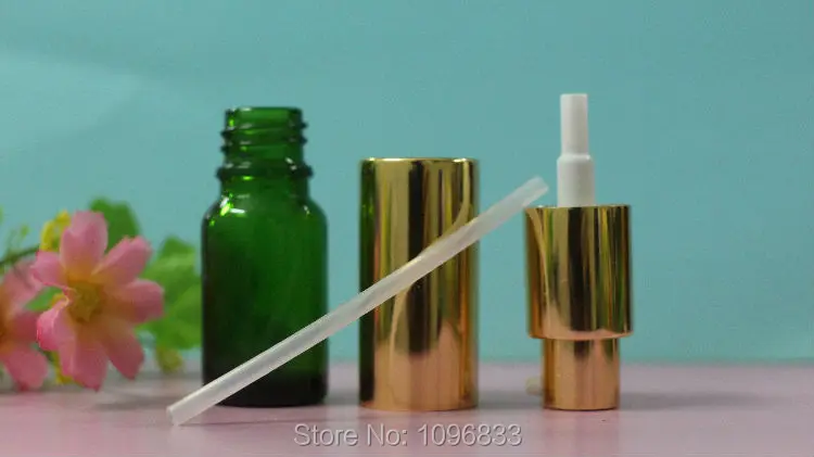 Зеленая стеклянная бутылка 10 мл с золотым колпачком и черным для косметического