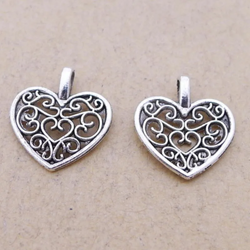 Оптовые партии 30 античные посеребренные маленькие полые подвески в форме сердца