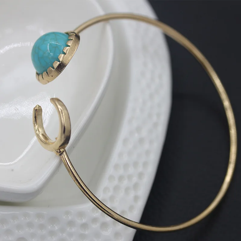 Женские браслеты-манжеты золотого и серебряного цвета с круглыми синими