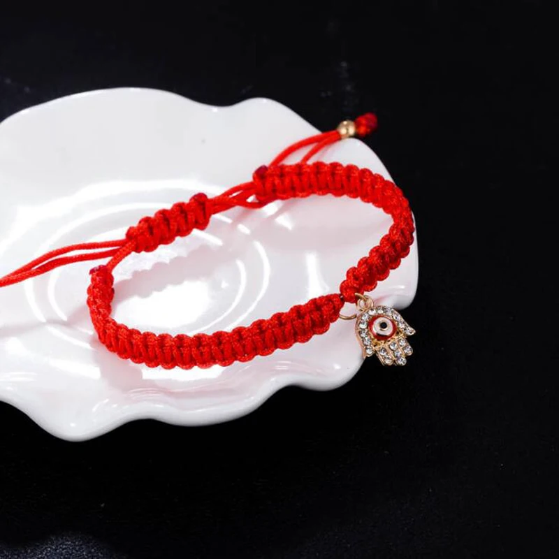 Женский плетеный браслет Fatima красный с подвесками в виде глаз стразы Турция |