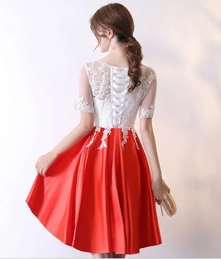 Кружевное коктейльное платье темно синего цвета с коротким рукавом и