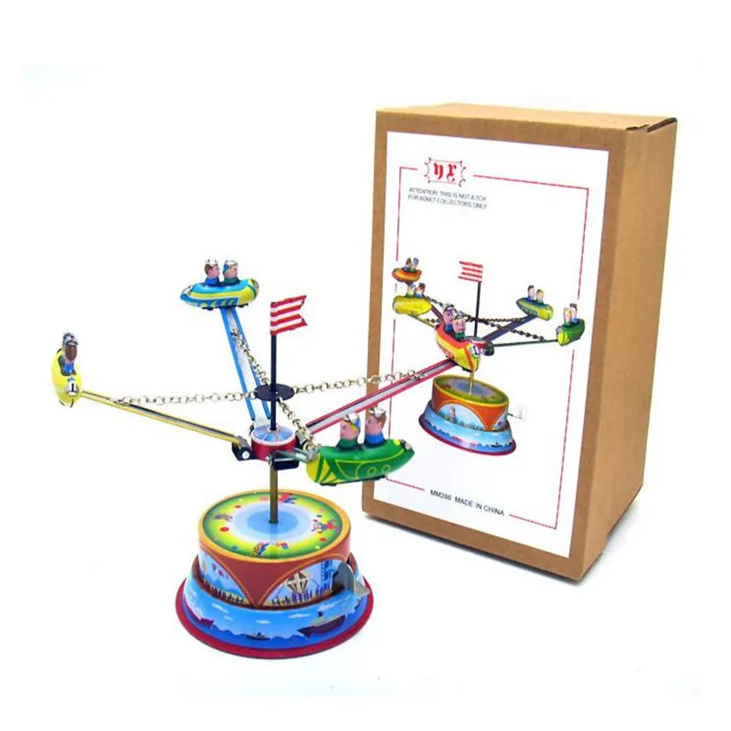 Винтажная вращающаяся жестяная игрушка с космическим кораблем классический