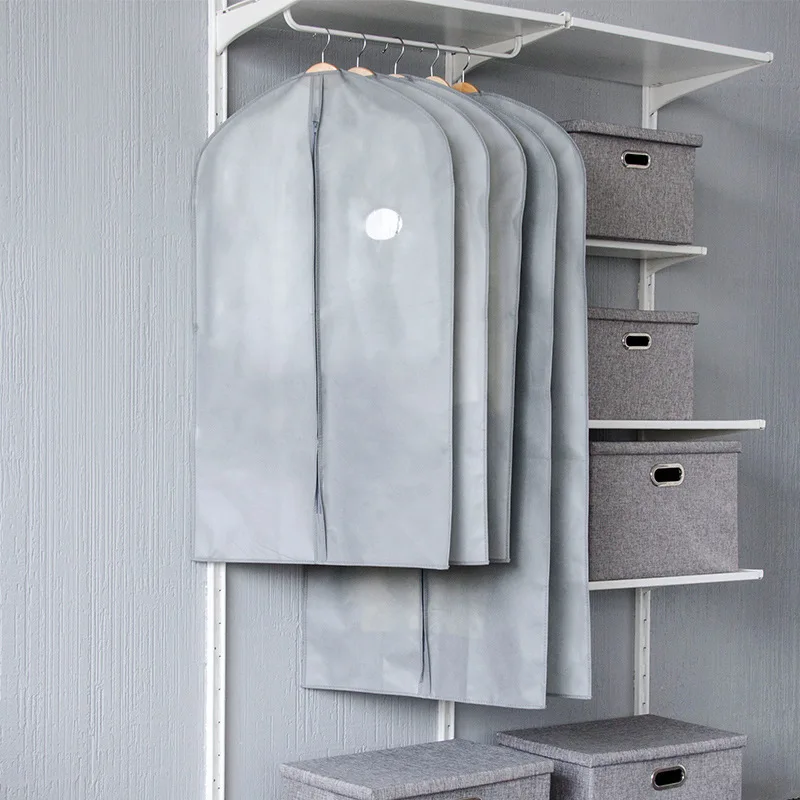

Thickening clothes, dustproof, moisture-proof, non-woven, Western-style clothes, coats, travel bags, transparent clothing covers