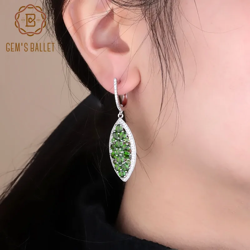 

Серьги-подвески из серебра 925 пробы с драгоценными камнями