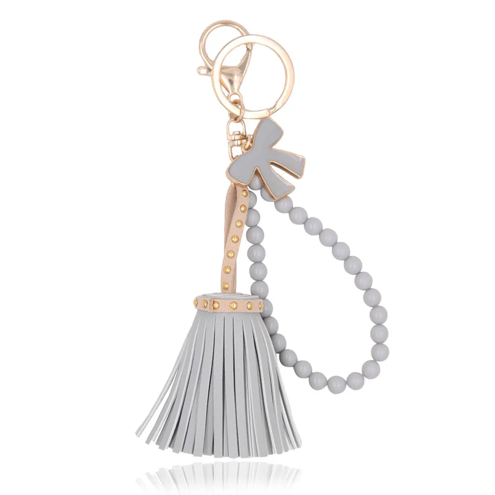 Брелок для ключей с кисточкой из искусственной кожи эмалированный брелок бантом