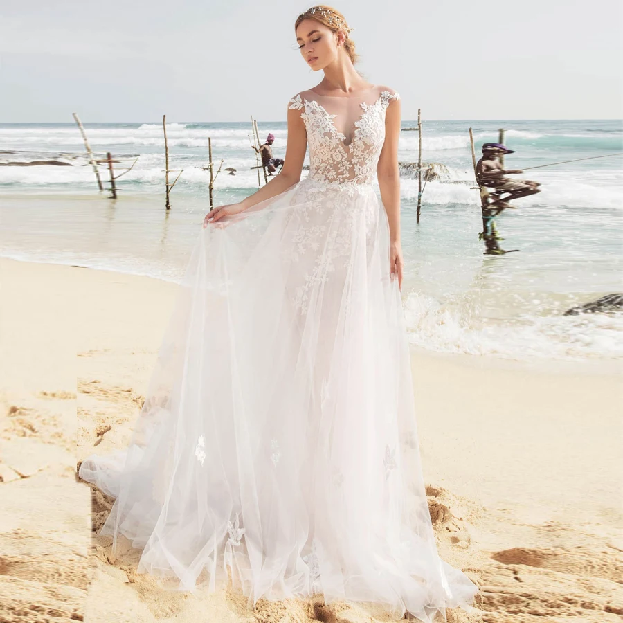 

Eightree Beach Wedding Dress Fashion Design Appliques A-line Dress Bridal 2019 Illusion O Neck Cap Sleeve Bride Gown Back Button