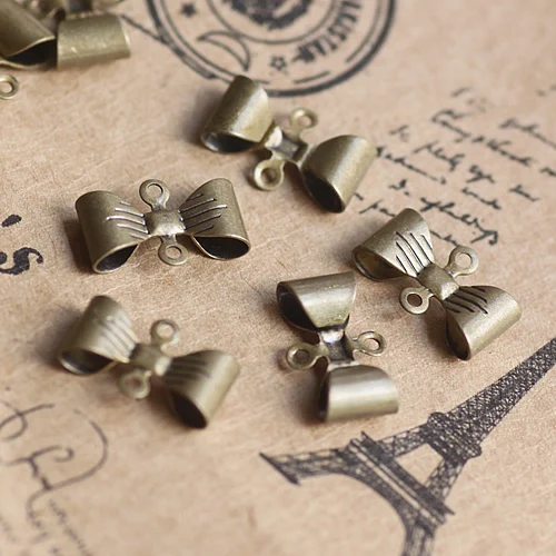 

100pcs 7*12mm Antique Bronze Copper Charms/Pendant ,DIY Vintage Jewelry Finding