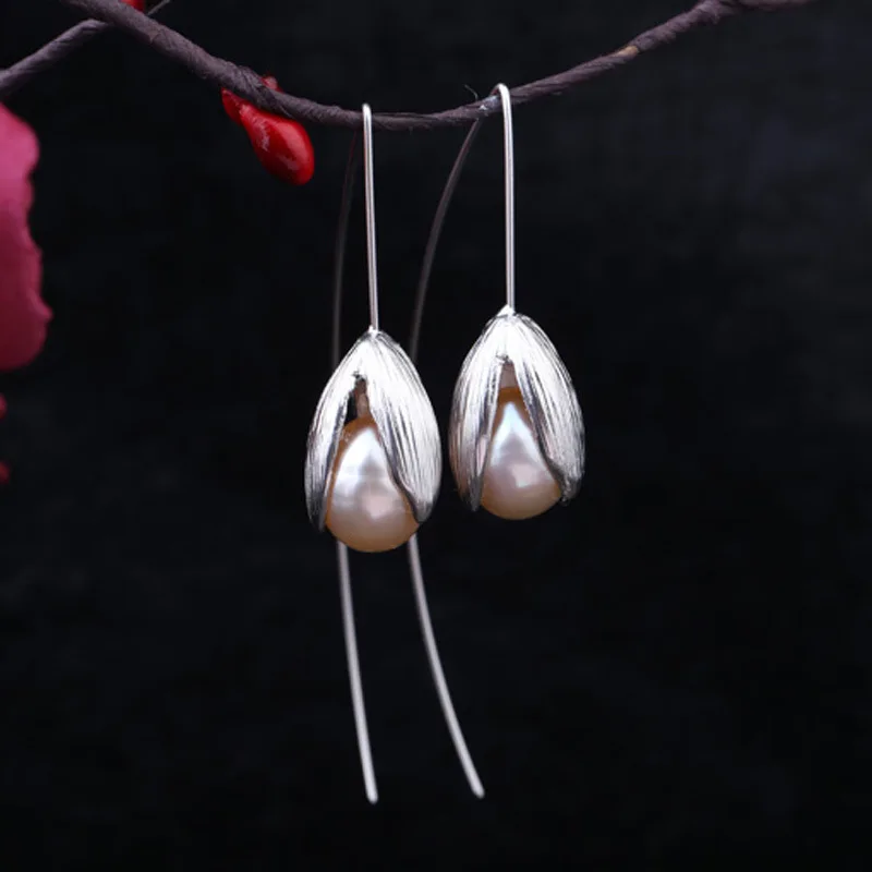 

Designer hand tulip pearl inlay long ear hook earrings