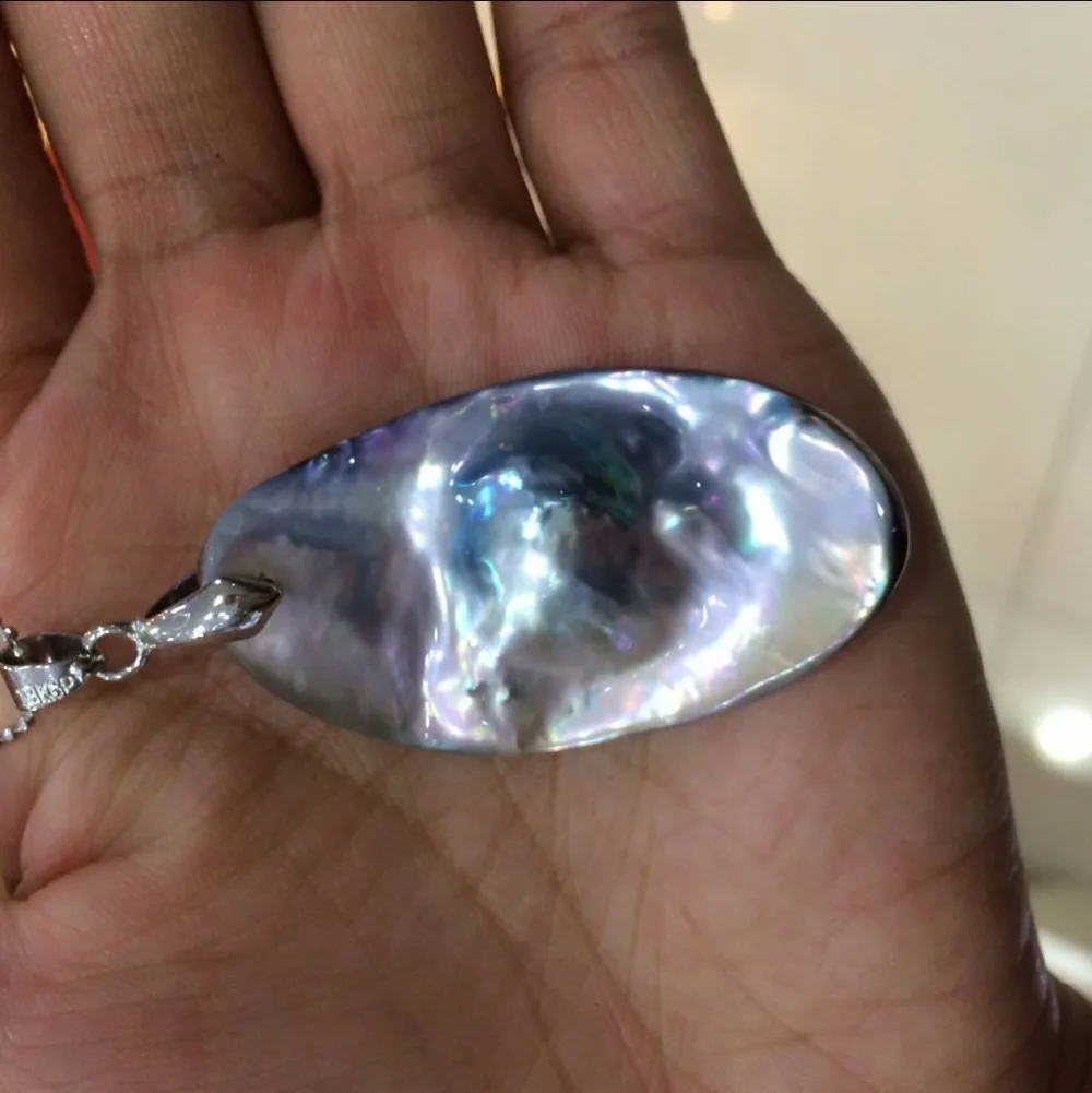 

Nice 25*35mm handmade shell unique shape pendant